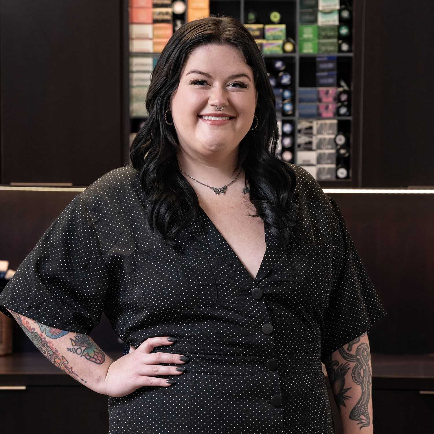 Portrait of Ash, a professional stylist at Rebel Hair, showcasing their expertise and style.