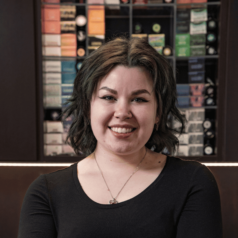 Portrait of Meikayla (She/Her), a professional stylist at Rebel Hair, showcasing their expertise and style.