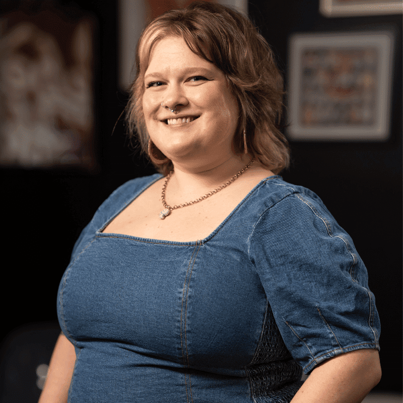 Portrait of Alaina (She/Her), a professional stylist at Rebel Hair, showcasing their expertise and style.