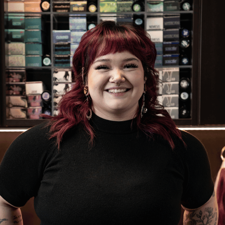 Portrait of María (She/Her), a professional stylist at Rebel Hair, showcasing their expertise and style.