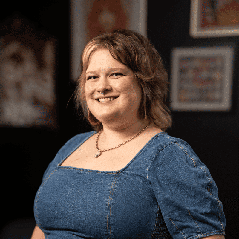 Portrait of Alaina (She/Her), a professional stylist at Rebel Hair, showcasing their expertise and style.