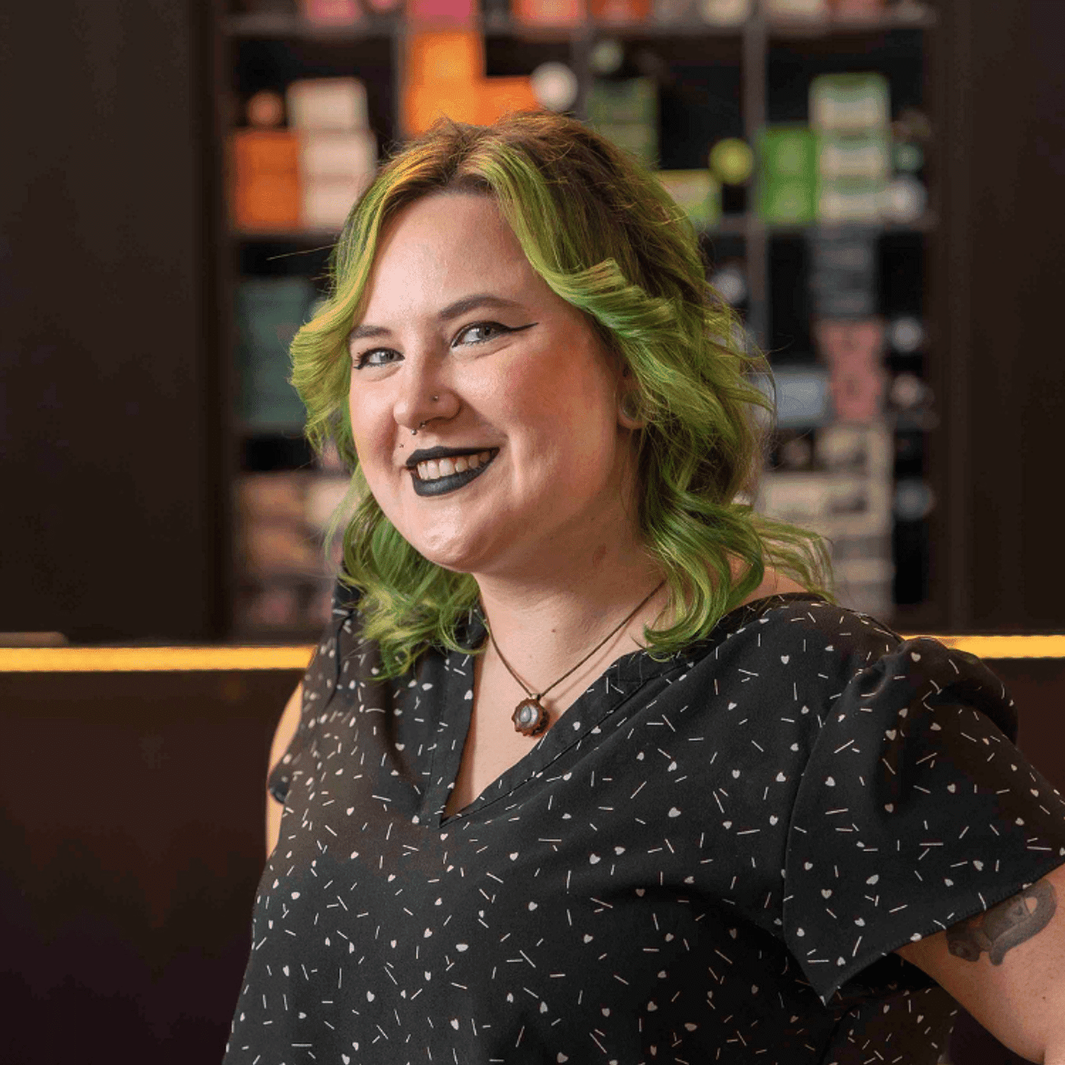 Portrait of Jessika (Jess), a professional stylist at Rebel Hair, showcasing their expertise and style.